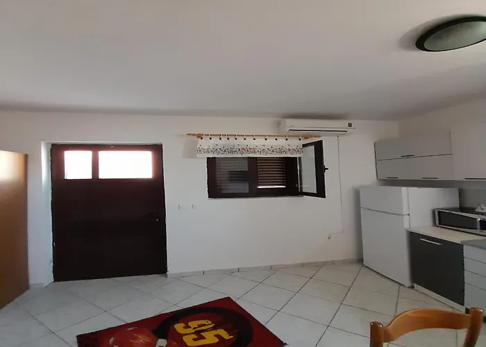 In Dinji Ka On The Beachfront Апартаменты